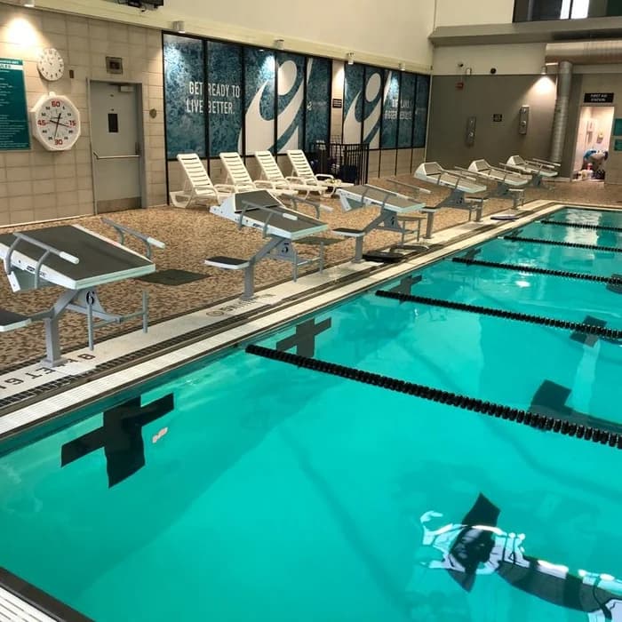 Indoor competition lap pool with starting blocks and lane markers