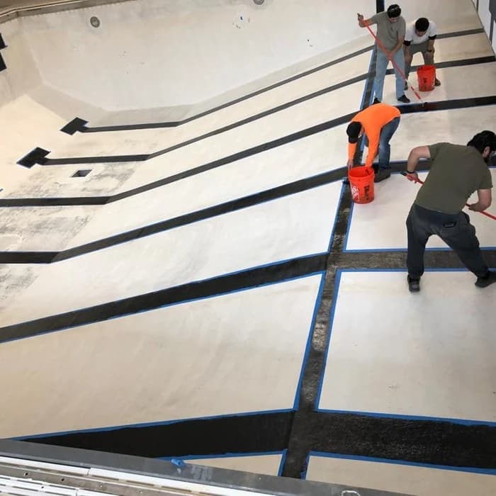 Pool surface being prepped during a resurfacing project