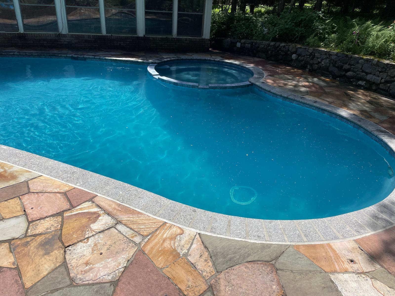Renovated kidney pool with new granite coping built by Marine Pool Renovations